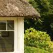 Detail of eaves above window ; thatched summerhouse,  Finnich Malise, Drymen, Stirling.