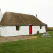 View of 20th century marram thatched cottage; Tigh na Boireach, Reumisgarry.