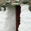 Detail of thatch and weights above doorway, probable 18th century thatched cottage; Struan Ruadh, Malaclete.