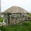 View of restored outbuilding with marram thatched roof; Hilltop Cottage, North Uist.