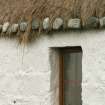 Detail of thatched roof with stone weights;  thatched cottage, Balivanich, Benbecula.