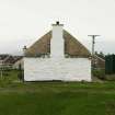 View of gable end and chimney stack; thatched cottage, Balivanich, Benbecula.