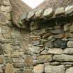 Detail of weighted thatch on renovated cottage;  Rhugha Sinish, South Uist.