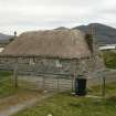 View of renovated single storey marram thatched cottage; 472a South Lochboisdale, South Uist.