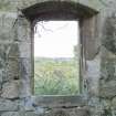 Distillery building, south range, grain miling area. Detail of arched window in east wall