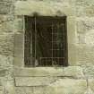 Malt barn/  store, west wall, detail of outside of window with glazing bars at 1st floor level