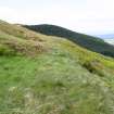 Looking E along the N Rampart with the Natural Ridge Interrupting in the Middle Distance