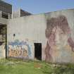 Laundry block. View of graffiti art by System from south west.