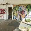 Accommodation block. View of graffiti art from south east.