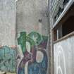 Accommodation block. View of graffiti art from south. (?)