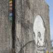 Accommodation block. View of graffiti art by Derm and Stormie Mills from south east.