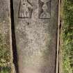 View of recumbent grave slab with pierced hand and chalice (with scale).