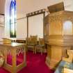 General view of pulpit and communion table and chairs.