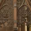 East transept. Screen at south end, tracery.