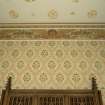 Vestry. Detail of cornice and stencill painted wall.