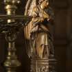 Chancel. Detail of carved angel on end of choir stall.