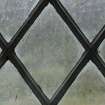 East window. Detail of writing etched on glass. (Image reversed for legibility.) 'Croick '