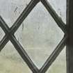 East window. Detail of writing etched on glass. (Image reversed for legibility.) 'Glencalvie Greenyard murder was in the year 1854 March 31'