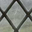 East window. Detail of writing etched on glass. (Image reversed for legibility.) 'Ros...James Borthwick...'