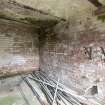 Interior of Royal Artillery store. detail of backets on SW wall.