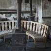 Ground floor, laundry, view of stoves and curved bench