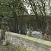 Curved wall extension to west of main house, view from north east