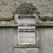 North front, detail of dormer with stone pediment