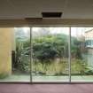 Corridor. View looking out to pond.