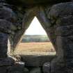 View through triangular opening of dovecot, looking south west to Strichen House