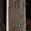 Larger Pictish cross slab, oblique view of rear with carved figures
