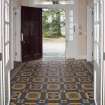 General view of Lobby showing tiled floor, looking out.