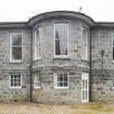 Detail of curved bay windows from West.