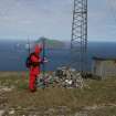 James Hepher GPS plotting Cleit 666 and 292457 Radar Station, with Boreray in the background