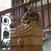 Ground floor. Secondary stair. Detail of newel post depicting waking sentry.