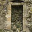North west wall, detail of doorway with relieving arch
