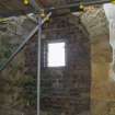 Interior. Second floor. West gable/bob wall.
View from north east of blocked beam opening.