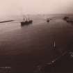 Ship in harbour mouth, titled 'Entrance to Natal Harbour'.
Marked 'B.W.CANEY. DURBAN.'  
The Port of Natal is now known as the Port of Durban.
PHOTOGRAPH ALBUM NO 11 : KIRSTY'S BANFF ALBUM