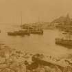 General view over Whitehill bay with boats. 
Titled: 'WHITEHILLS'
PHOTOGRAPH ALBUM NO 11: KIRSTY'S BANFF ALBUM.