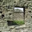 West range, view looking through window on south wall to inside of gable beyond