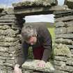 West range, west wall, view of Piers Dixon measuring window opening