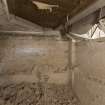 Interior. North end of courtyard. Lime pit, view of interior from south