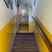 Interior. South range, 1st floor, Upstairs office. View of staircase leading to upstairs office