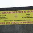 North gable. Detail of company sign 'L.Grandison & Son'