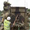 Mermaid being lifted by crane