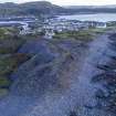 Oblique aerial view of slate waste bing on south side of Easdale and associated with post-1899 tramway