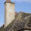 Detail of chimney and Caithness slab roof.