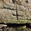 A close-up view of the incised cross from the NW.