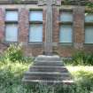 Memorial cross to the front of the school building