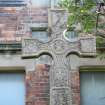 Memorial cross to the front of the school building