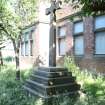 Memorial cross to the front of the school building